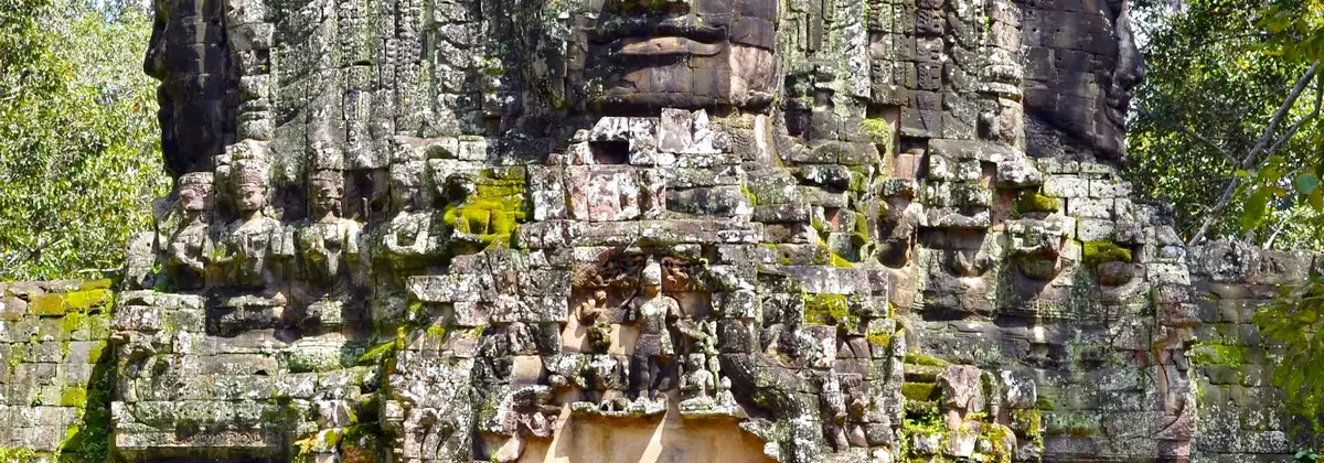The carved stone faces of Angkor