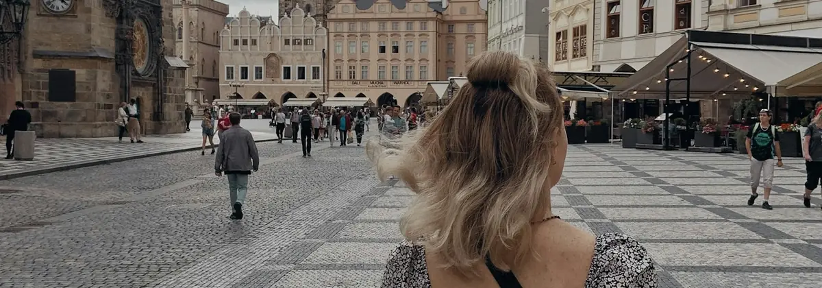 Visitors on a Prague square