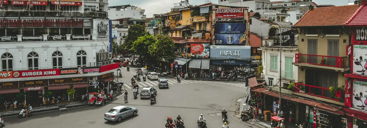 Shops and scooters on a Hanoi street